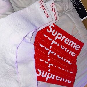 9 supreme stickers with one pair of brand new socks bundle